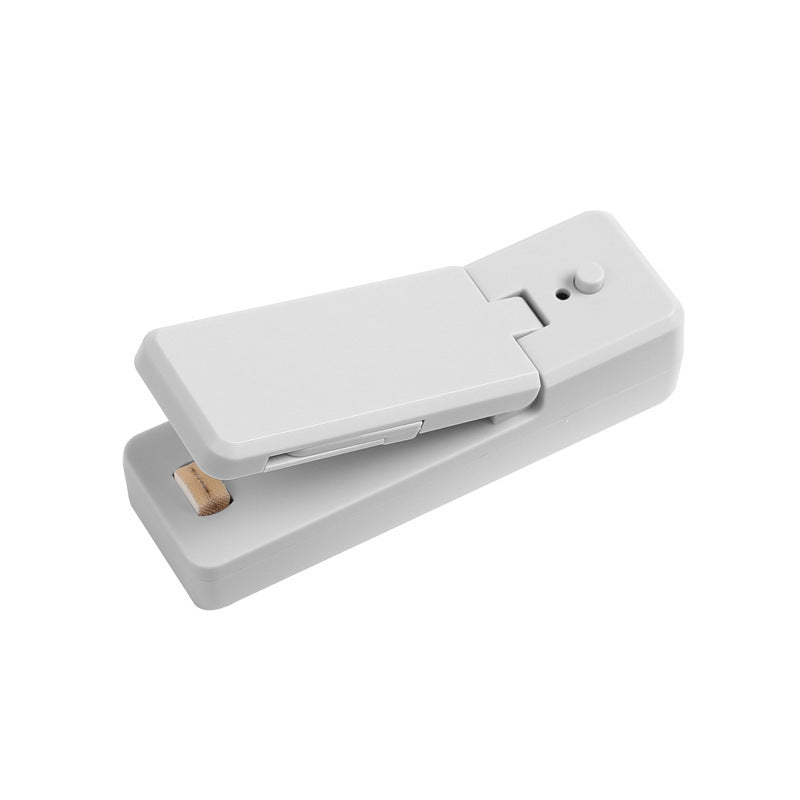 Mini sellador térmico portátil y recargable para bolsas de alimentos.